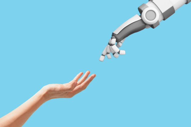 Human Hand and Robot Hand reaching out to touch